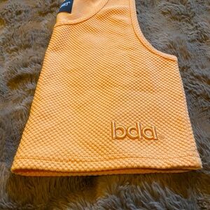 bda® Women's Textured Crop Tank in Peach Orange
